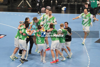 2024-04-30 - Füchse Berlin players celebrate at full time during the EHF European League, Quarter-finals, 2nd leg handball match between HBC Nantes and Füchse Berlin on April 30, 2024 at H Arena in Nantes, France - HANDBALL - EHF EUROPEAN LEAGUE - NANTES V BERLIN - HANDBALL - OTHER SPORTS