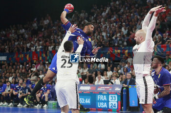 2024-05-11 - Timothey N’GUESSAN of France and Patrick HUTER of United States and Domagoj SRSEN of United States during the International Friendly Handball match between France and United States on May 11, 2024 at LDLC Arena in Décines-Charpieu near Lyon, France - HANDBALL - FRIENDLY GAME - FRANCE V UNITED STATES - HANDBALL - OTHER SPORTS