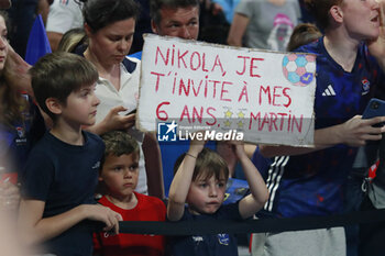 2024-05-11 - Fan of France and Nikola KARABATIC of France during the International Friendly Handball match between France and United States on May 11, 2024 at LDLC Arena in Décines-Charpieu near Lyon, France - HANDBALL - FRIENDLY GAME - FRANCE V UNITED STATES - HANDBALL - OTHER SPORTS