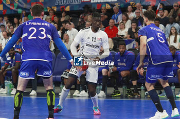 2024-05-11 - Aboubakar FOFANA of United States and Nedim REMILI of France and Ludovic FABREGAS of France during the International Friendly Handball match between France and United States on May 11, 2024 at LDLC Arena in Décines-Charpieu near Lyon, France - HANDBALL - FRIENDLY GAME - FRANCE V UNITED STATES - HANDBALL - OTHER SPORTS