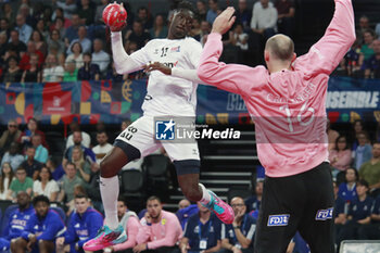 2024-05-11 - Aboubakar FOFANA of United States and Charles BOLZINGER of France during the International Friendly Handball match between France and United States on May 11, 2024 at LDLC Arena in Décines-Charpieu near Lyon, France - HANDBALL - FRIENDLY GAME - FRANCE V UNITED STATES - HANDBALL - OTHER SPORTS