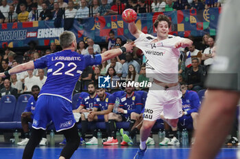 2024-05-11 - Ian HUTER of United States and Luka KARABATIC of France during the International Friendly Handball match between France and United States on May 11, 2024 at LDLC Arena in Décines-Charpieu near Lyon, France - HANDBALL - FRIENDLY GAME - FRANCE V UNITED STATES - HANDBALL - OTHER SPORTS