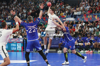 2024-05-11 - Ian HUTER of United States and Valentin PORTE of France and Luka KARABATIC of France during the International Friendly Handball match between France and United States on May 11, 2024 at LDLC Arena in Décines-Charpieu near Lyon, France - HANDBALL - FRIENDLY GAME - FRANCE V UNITED STATES - HANDBALL - OTHER SPORTS