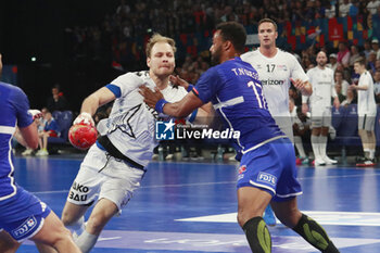 2024-05-11 - PAUL SKORUPA of United States and Timothey N’GUESSAN of France during the International Friendly Handball match between France and United States on May 11, 2024 at LDLC Arena in Décines-Charpieu near Lyon, France - HANDBALL - FRIENDLY GAME - FRANCE V UNITED STATES - HANDBALL - OTHER SPORTS