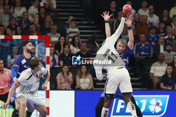 2024-05-11 - Aboubakar FOFANA of United States and Luka KARABATIC of France and Ian HUTER of United States and Ludovic FABREGAS of France during the International Friendly Handball match between France and United States on May 11, 2024 at LDLC Arena in Décines-Charpieu near Lyon, France - HANDBALL - FRIENDLY GAME - FRANCE V UNITED STATES - HANDBALL - OTHER SPORTS