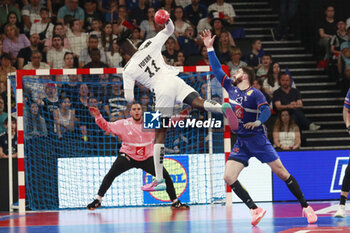 2024-05-11 - Aboubakar FOFANA of United States and Ludovic FABREGAS of France and Samir BELLAHCENE of France during the International Friendly Handball match between France and United States on May 11, 2024 at LDLC Arena in Décines-Charpieu near Lyon, France - HANDBALL - FRIENDLY GAME - FRANCE V UNITED STATES - HANDBALL - OTHER SPORTS