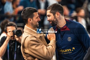 2024-05-31 - Novak DJOKOVIC and Nikola Karabatic of PSG during the French championship Liqui Molly Starligue Handball match between Paris Saint-Germain Handball and PAUC (Pays d'Aix Université Club Handball) on May 31, 2024 at Accor Arena in Paris, France - HANDBALL - FRENCH CHAMP - PARIS SG V PAUC - HANDBALL - OTHER SPORTS