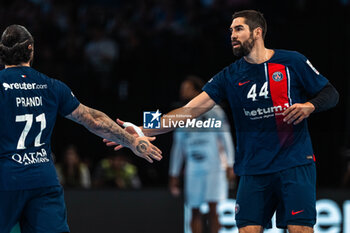 2024-05-31 - Nikola Karabatic of PSG and Elohim Prandi of PSG during the French championship Liqui Molly Starligue Handball match between Paris Saint-Germain Handball and PAUC (Pays d'Aix Université Club Handball) on May 31, 2024 at Accor Arena in Paris, France - HANDBALL - FRENCH CHAMP - PARIS SG V PAUC - HANDBALL - OTHER SPORTS