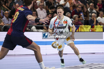 24/10/2024 - Omar Magnusson of SC Magdeburg during the EHF Champions League, Group Phase, handball match between FC Barcelona and SC Magdeburg on October 24, 2024 at Palau Blaugrana in Barcelona, Spain - HANDBALL - CHAMPIONS LEAGUE - BARCELONA V MAGDEBURG - PALLAMANO - ALTRO