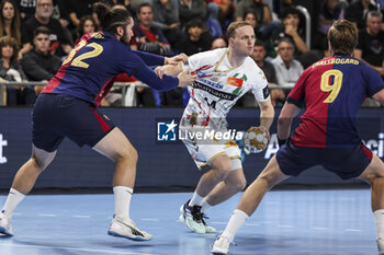 24/10/2024 - Omar Magnusson of SC Magdeburg during the EHF Champions League, Group Phase, handball match between FC Barcelona and SC Magdeburg on October 24, 2024 at Palau Blaugrana in Barcelona, Spain - HANDBALL - CHAMPIONS LEAGUE - BARCELONA V MAGDEBURG - PALLAMANO - ALTRO