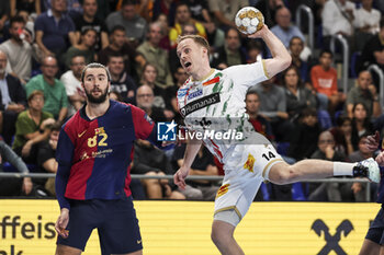 24/10/2024 - Omar Magnusson of SC Magdeburg and Luis Frade of FC Barcelona during the EHF Champions League, Group Phase, handball match between FC Barcelona and SC Magdeburg on October 24, 2024 at Palau Blaugrana in Barcelona, Spain - HANDBALL - CHAMPIONS LEAGUE - BARCELONA V MAGDEBURG - PALLAMANO - ALTRO