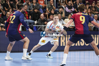 24/10/2024 - Omar Magnusson of SC Magdeburg during the EHF Champions League, Group Phase, handball match between FC Barcelona and SC Magdeburg on October 24, 2024 at Palau Blaugrana in Barcelona, Spain - HANDBALL - CHAMPIONS LEAGUE - BARCELONA V MAGDEBURG - PALLAMANO - ALTRO