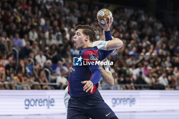 24/10/2024 - Domen Makuc of FC Barcelona and Christian O'Sullivan of SC Magdeburg during the EHF Champions League, Group Phase, handball match between FC Barcelona and SC Magdeburg on October 24, 2024 at Palau Blaugrana in Barcelona, Spain - HANDBALL - CHAMPIONS LEAGUE - BARCELONA V MAGDEBURG - PALLAMANO - ALTRO