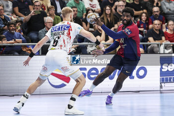 24/10/2024 - Dika Mem of FC Barcelona and Matthias Musche of SC Magdeburg during the EHF Champions League, Group Phase, handball match between FC Barcelona and SC Magdeburg on October 24, 2024 at Palau Blaugrana in Barcelona, Spain - HANDBALL - CHAMPIONS LEAGUE - BARCELONA V MAGDEBURG - PALLAMANO - ALTRO