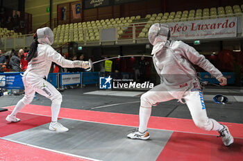 2024-03-01 - Kon (JAM) compete against Italian fencer in action - FENCING TEAM WORLD CUP - FENCING - OTHER SPORTS