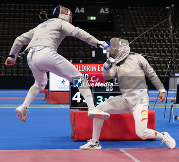 2024-06-23 - Basel Switzerland, 06/23/2024: YILDIRIM Enver (Turkey) against MADRIGAL Santiago (Spain) during Fencing Euro Basel 2024. Fencing Euro Basel 2024 took place at the St. Jakobshalle, in Basel.
Credit: Patrick Dancel/LiveMedia.
 - FENCINGEURO BASEL 2024 - FENCING - OTHER SPORTS