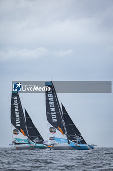 2024-09-06 - Sam Goodchild on Imoca Vulnerable - For the Planet and Thomas Ruyant on Imoca Vulnerable - For People during a training session prior the Vendée Globe 2024 on September 6, 2024, off Groix in France - SAILING - VENDEE GLOBE 2024 - THOMAS RUYANT - IMOCA VULNERABLE - SAILING - OTHER SPORTS