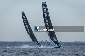 2024-09-06 - Sam Goodchild on Imoca Vulnerable - For the Planet and Thomas Ruyant on Imoca Vulnerable - For People during a training session prior the Vendée Globe 2024 on September 6, 2024, off Groix in France - SAILING - VENDEE GLOBE 2024 - THOMAS RUYANT - IMOCA VULNERABLE - SAILING - OTHER SPORTS