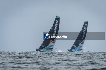 2024-09-06 - Sam Goodchild on Imoca Vulnerable - For the Planet and Thomas Ruyant on Imoca Vulnerable - For People during a training session prior the Vendée Globe 2024 on September 6, 2024, off Groix in France - SAILING - VENDEE GLOBE 2024 - THOMAS RUYANT - IMOCA VULNERABLE - SAILING - OTHER SPORTS