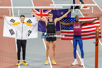 2024-03-03 - Sanghyeok Woo (KOR) Bronze medal, Hamish Kerr (NZL) Gold medal, Shelby McEwen (USA) Silver medal, High Jump Men during the 2024 World Athletics Indoor Championships on 3 March 2024 at Commonwealth Arena in Glasgow, Scotland - ATHLETICS - WORLD ATHLETICS INDOOR CHAMPIONSHIPS 2024 - INTERNATIONALS - ATHLETICS