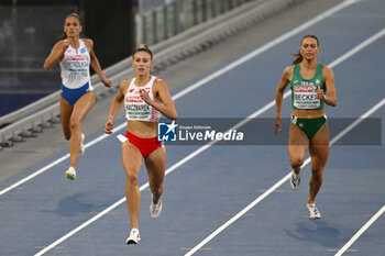 2024-06-09 - Natalia KACZMAREK of Poland in action in the semifinals of the women's 400 meters during the European Athletics Championship 2024 at Olimpico Stadium in Rome, Italy, 9 June 2024 - EUROPEAN ATHLETICS CHAMPIONSHIPS - INTERNATIONALS - ATHLETICS