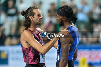 2024-09-03 - (L to R) Gianmarco Tamberi from Italy and Romaine Beckford from Jamaica during the 60th Palio Citta’ della Quercia, valid for the World Athletics Continental Tour at Quercia Stadium on September 3, 2024, Rovereto, Italy. - 60TH PALIO CITTà DELLA QUERCIA - INTERNATIONALS - ATHLETICS