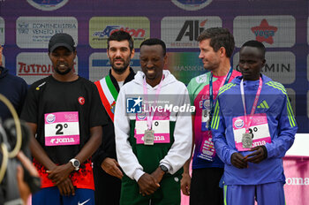 2024-10-27 - Abebe Tilahun, Ilham Tanui Ozbilen and Kipsambu Kimakal podium of 38^ Wizz Air Venicemarathon - 38^ WIZZ AIR VENICEMARATHON - MARATHON - ATHLETICS