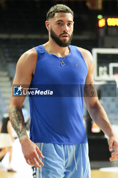 2024-07-06 - Isaïa Cordinier of France warms up during the International Friendly Basketball match between Germany and France on 6 July 2024 at Lanxess Arena in Cologne, Germany - BASKETBALL - FRIENDLY GAME - GERMANY V FRANCE - FRIENDLY MATCH - BASKETBALL