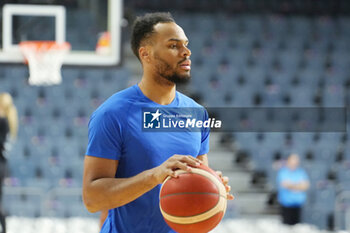 2024-07-06 - Élie Okobo of France warms up during the International Friendly Basketball match between Germany and France on 6 July 2024 at Lanxess Arena in Cologne, Germany - BASKETBALL - FRIENDLY GAME - GERMANY V FRANCE - FRIENDLY MATCH - BASKETBALL