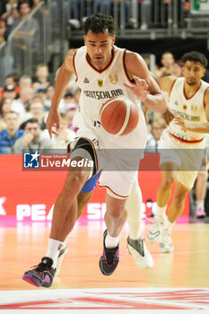 2024-07-06 - Oscar Da Silva of Germany during the International Friendly Basketball match between Germany and France on 6 July 2024 at Lanxess Arena in Cologne, Germany - BASKETBALL - FRIENDLY GAME - GERMANY V FRANCE - FRIENDLY MATCH - BASKETBALL