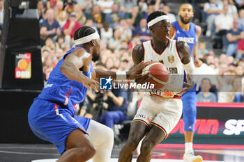 2024-07-06 - Dennis Schroder of Germany and Guerschon Yabusele of France during the International Friendly Basketball match between Germany and France on 6 July 2024 at Lanxess Arena in Cologne, Germany - BASKETBALL - FRIENDLY GAME - GERMANY V FRANCE - FRIENDLY MATCH - BASKETBALL