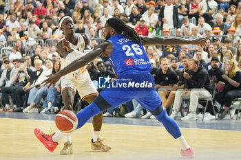 2024-07-06 - Dennis Schroder of Germany and Mathias Lessort of France during the International Friendly Basketball match between Germany and France on 6 July 2024 at Lanxess Arena in Cologne, Germany - BASKETBALL - FRIENDLY GAME - GERMANY V FRANCE - FRIENDLY MATCH - BASKETBALL