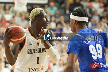 2024-07-06 - Isaac Bonga of Germany during the International Friendly Basketball match between Germany and France on 6 July 2024 at Lanxess Arena in Cologne, Germany - BASKETBALL - FRIENDLY GAME - GERMANY V FRANCE - FRIENDLY MATCH - BASKETBALL