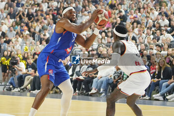 2024-07-06 - Guerschon Yabusele of France and Dennis Schroder of Germany during the International Friendly Basketball match between Germany and France on 6 July 2024 at Lanxess Arena in Cologne, Germany - BASKETBALL - FRIENDLY GAME - GERMANY V FRANCE - FRIENDLY MATCH - BASKETBALL