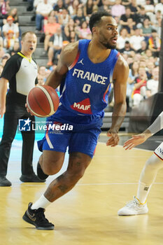 2024-07-06 - Élie Okobo of France during the International Friendly Basketball match between Germany and France on 6 July 2024 at Lanxess Arena in Cologne, Germany - BASKETBALL - FRIENDLY GAME - GERMANY V FRANCE - FRIENDLY MATCH - BASKETBALL