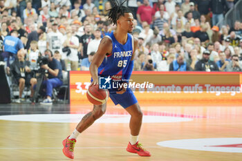 2024-07-06 - Matthew Strazel of France during the International Friendly Basketball match between Germany and France on 6 July 2024 at Lanxess Arena in Cologne, Germany - BASKETBALL - FRIENDLY GAME - GERMANY V FRANCE - FRIENDLY MATCH - BASKETBALL