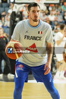 2024-07-06 - Nando de Colo of France warms up during the International Friendly Basketball match between Germany and France on 6 July 2024 at Lanxess Arena in Cologne, Germany - BASKETBALL - FRIENDLY GAME - GERMANY V FRANCE - FRIENDLY MATCH - BASKETBALL