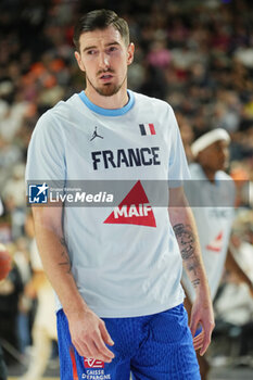 2024-07-06 - Nando de Colo of France warms up during the International Friendly Basketball match between Germany and France on 6 July 2024 at Lanxess Arena in Cologne, Germany - BASKETBALL - FRIENDLY GAME - GERMANY V FRANCE - FRIENDLY MATCH - BASKETBALL