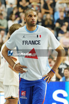 2024-07-06 - Nicolas Batum of France warms up during the International Friendly Basketball match between Germany and France on 6 July 2024 at Lanxess Arena in Cologne, Germany - BASKETBALL - FRIENDLY GAME - GERMANY V FRANCE - FRIENDLY MATCH - BASKETBALL