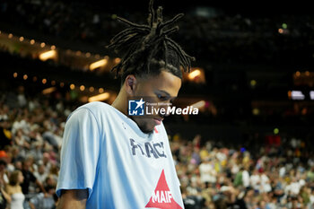 2024-07-06 - Matthew Strazel of France warms up during the International Friendly Basketball match between Germany and France on 6 July 2024 at Lanxess Arena in Cologne, Germany - BASKETBALL - FRIENDLY GAME - GERMANY V FRANCE - FRIENDLY MATCH - BASKETBALL