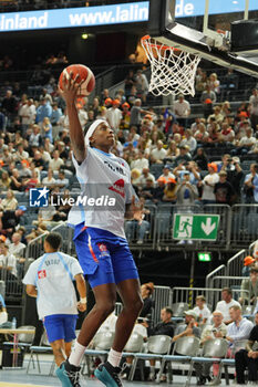 2024-07-06 - Bilal Coulibaly of France warms up during the International Friendly Basketball match between Germany and France on 6 July 2024 at Lanxess Arena in Cologne, Germany - BASKETBALL - FRIENDLY GAME - GERMANY V FRANCE - FRIENDLY MATCH - BASKETBALL