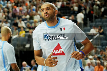 2024-07-06 - Nicolas Batum of France warms up during the International Friendly Basketball match between Germany and France on 6 July 2024 at Lanxess Arena in Cologne, Germany - BASKETBALL - FRIENDLY GAME - GERMANY V FRANCE - FRIENDLY MATCH - BASKETBALL