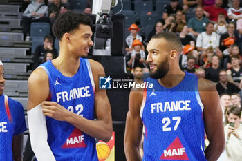 2024-07-06 - Victor Wembanyama and Rudy Gobert of France during the International Friendly Basketball match between Germany and France on 6 July 2024 at Lanxess Arena in Cologne, Germany - BASKETBALL - FRIENDLY GAME - GERMANY V FRANCE - FRIENDLY MATCH - BASKETBALL