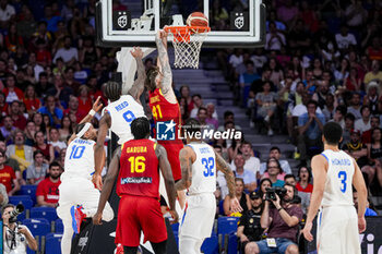 2024-07-23 - Juancho Hernangomez (C) dunks the ball during the Basketball International Friendly match between Spain and Puerto Rico at WiZink Center on July 23, 2024 in Madrid, Spain. - SPAIN VS PUERTO RICO - FRIENDLY MATCH - BASKETBALL