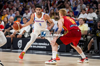 2024-07-23 - Jordan Howard (L) of Puerto Rico in action against Alberto Diaz (R) of Spain during the Basketball International Friendly match between Spain and Puerto Rico at WiZink Center on July 23, 2024 in Madrid, Spain. - SPAIN VS PUERTO RICO - FRIENDLY MATCH - BASKETBALL