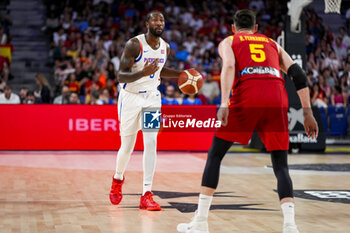 2024-07-23 - Davon Reed (L) of Puerto Rico in action against Rudy Fernandez (R) of Spain during the Basketball International Friendly match between Spain and Puerto Rico at WiZink Center on July 23, 2024 in Madrid, Spain. - SPAIN VS PUERTO RICO - FRIENDLY MATCH - BASKETBALL