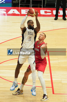 2024-07-22 - Lebron James of Usa and Daniel Theis of Germany during the International Friendly basketball match between USA and Germany on 22 July 2024 at O2 Arena in London, England - BASKETBALL - FRIENDLY GAME - USA V GERMANY - FRIENDLY MATCH - BASKETBALL