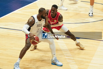 2024-07-22 - Lebron James of Usa and Dennis Schröder of Germany during the International Friendly basketball match between USA and Germany on 22 July 2024 at O2 Arena in London, England - BASKETBALL - FRIENDLY GAME - USA V GERMANY - FRIENDLY MATCH - BASKETBALL