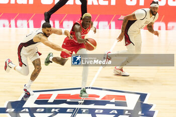 2024-07-22 - Isaac Bonga of Germany and Jayson Tatum of Usa during the International Friendly basketball match between USA and Germany on 22 July 2024 at O2 Arena in London, England - BASKETBALL - FRIENDLY GAME - USA V GERMANY - FRIENDLY MATCH - BASKETBALL