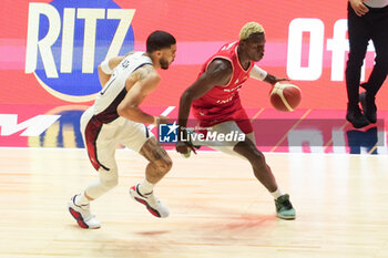 2024-07-22 - Isaac Bonga of Germany and Jayson Tatum of Usa during the International Friendly basketball match between USA and Germany on 22 July 2024 at O2 Arena in London, England - BASKETBALL - FRIENDLY GAME - USA V GERMANY - FRIENDLY MATCH - BASKETBALL